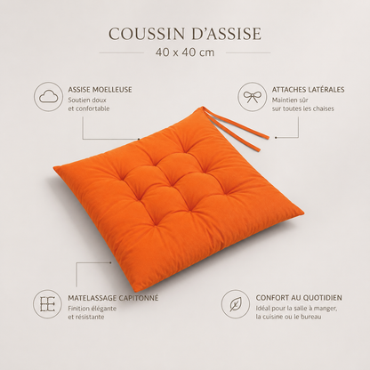 Coussin de chaise orange présenté avec son assise moelleuse, ses attaches latérales et son matelassage capitonné.
