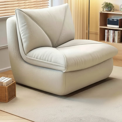 Fauteuil pouf salon en velours côtelé beige dans un coin salon élégant