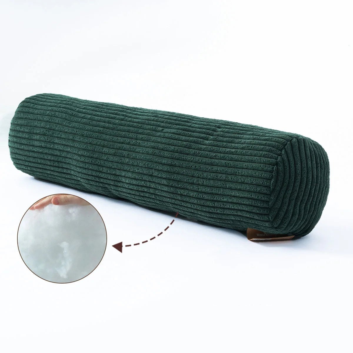 Coussin cylindrique vert foncé en velours côtelé, avec un aperçu du rembourrage.