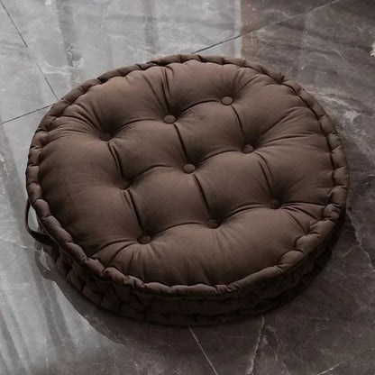 Gros coussin de sol marron