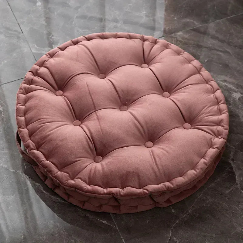 Gros coussin de sol rose