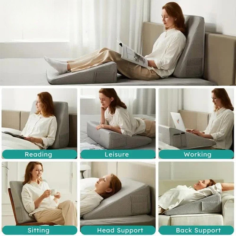 Coussin en tissu gris clair, en forme de support, placé sur un canapé, idéal pour le confort au quotidien