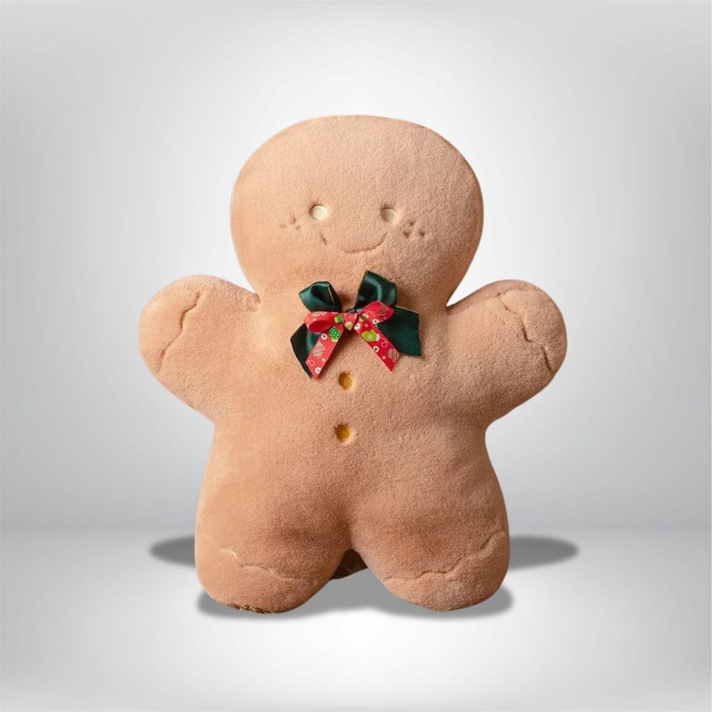 Coussin décoratif en forme de bonhomme en pain d'épice avec un nœud rouge, idéal pour une ambiance festive