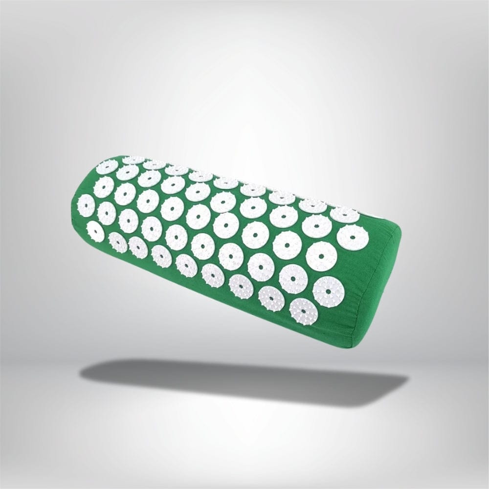 Coussin décoratif vert en forme de rouleau avec des motifs ronds blancs, idéal pour un canapé ou un lit