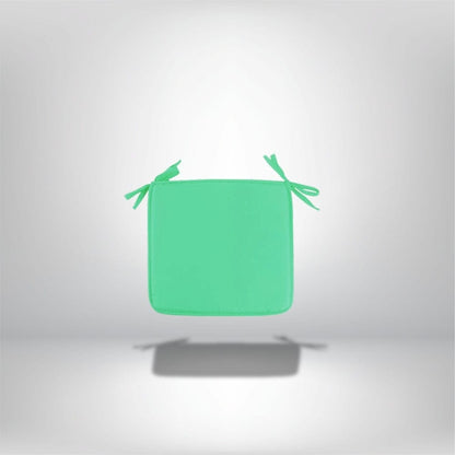Coussin de chaise carré vert en tissu uni, parfait pour apporter une touche de couleur à votre intérieur