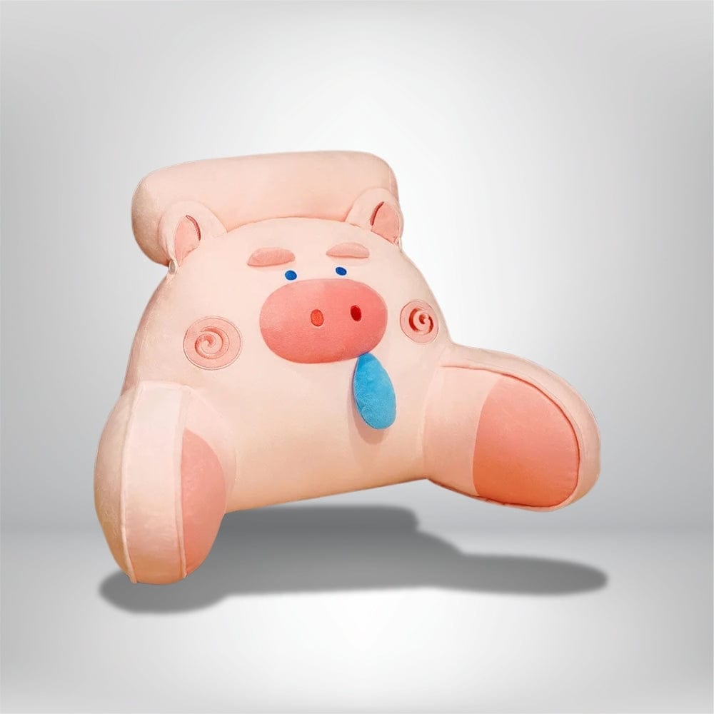 Coussin décoratif en forme de cochon, en velours rose, posé sur un lit, ajoutant une touche ludique à la chambre