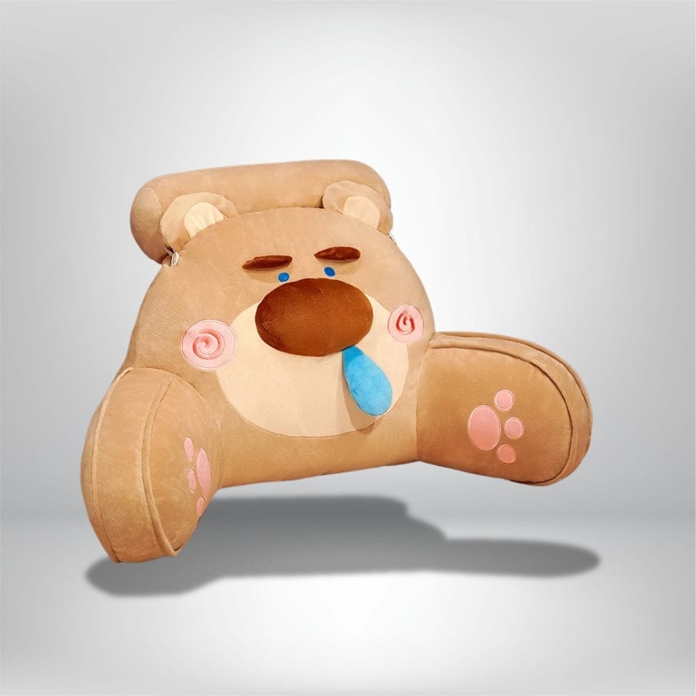 Coussin décoratif en forme d'ours, en velours beige, posé sur un lit, idéal pour la lecture