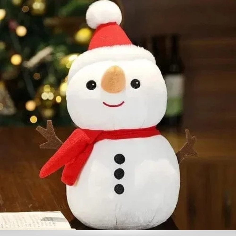 Coussin décoratif en forme de bonhomme de neige, blanc avec un chapeau rouge et une écharpe, parfait pour Noël