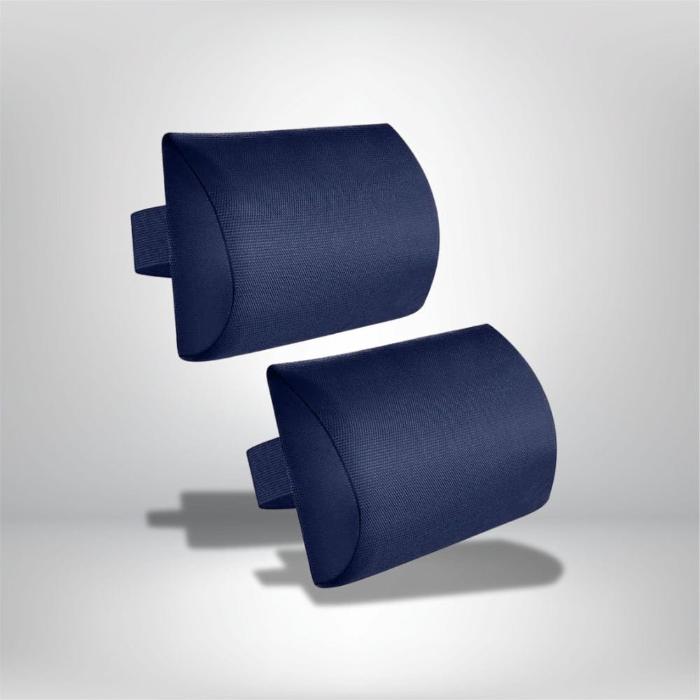 Coussins décoratifs en tissu bleu marine, de forme arrondie, posés sur une surface claire