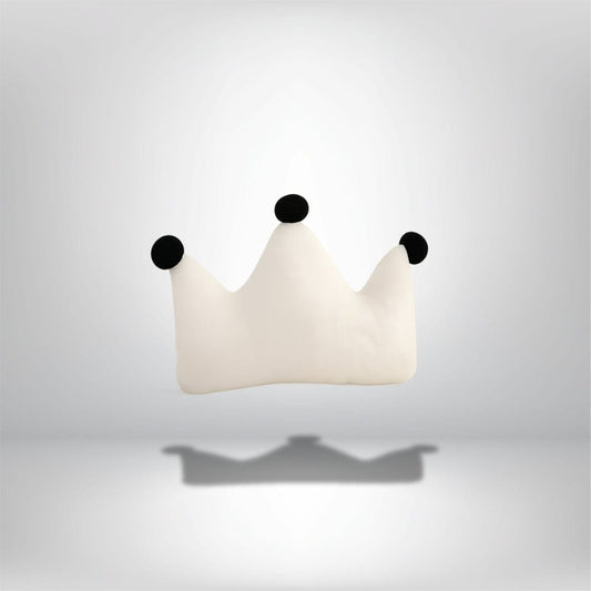 Coussin décoratif en forme de couronne, couleur blanche avec pompons noirs, idéal pour un salon moderne