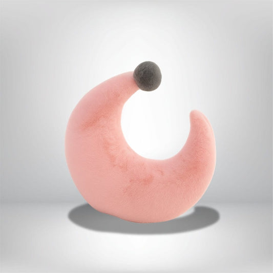 Coussin décoratif doux en forme de croissant, rose avec un pompon gris, idéal pour un canapé ou une chambre