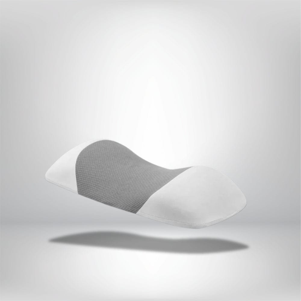 Coussin ergonomique de couleur grise et blanche, posé sur un fond neutre, idéal pour un soutien lombaire