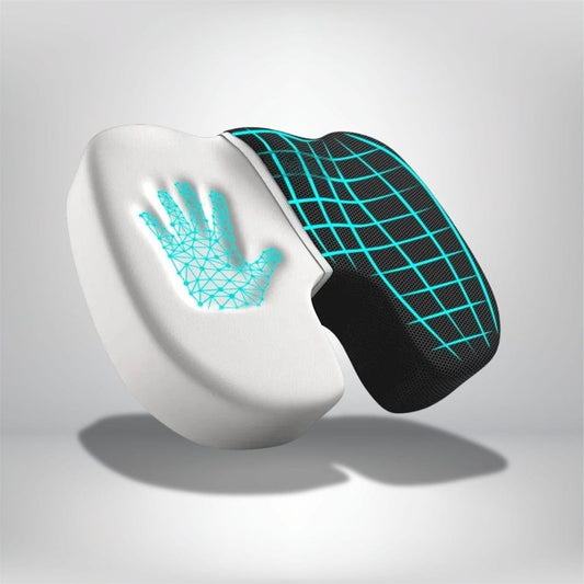 Coussin ergonomique blanc et noir avec motif en grille turquoise, posé sur un fond neutre