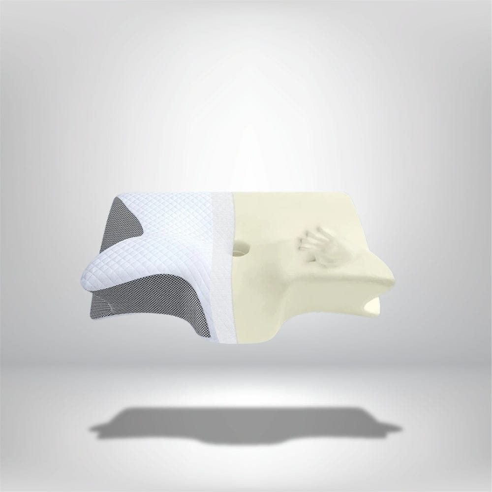 Coussin ergonomique nuque en mousse blanche et tissu à motifs, posé sur un fond neutre