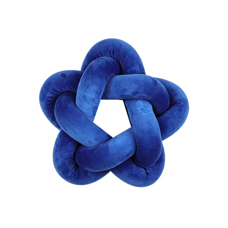 Coussin décoratif en velours bleu en forme d'étoile avec un nœud, idéal pour un canapé ou une chambre