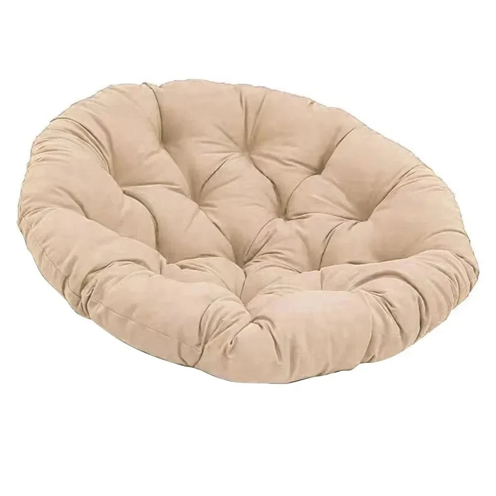 Coussin décoratif rond en velours beige, idéal pour un salon ou une chambre, avec un design moelleux et confortable