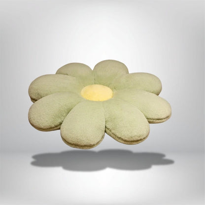 Coussin décoratif en forme de fleur, vert pastel avec un centre jaune, idéal pour un canapé ou une chaise