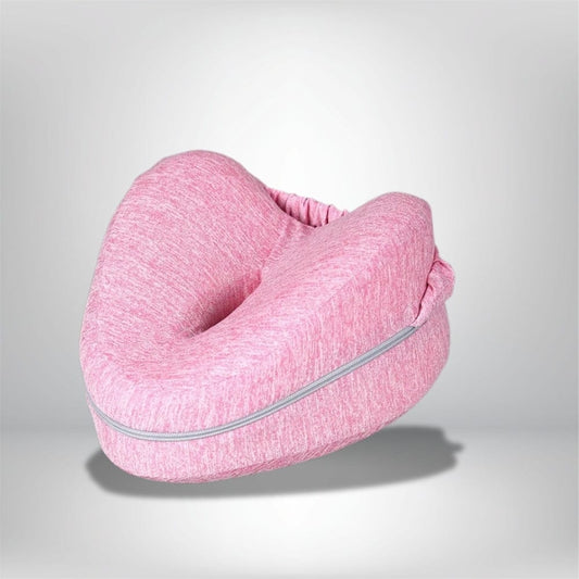 Coussin décoratif en forme de genoux, en tissu rose, idéal pour un confort nocturne sur un lit