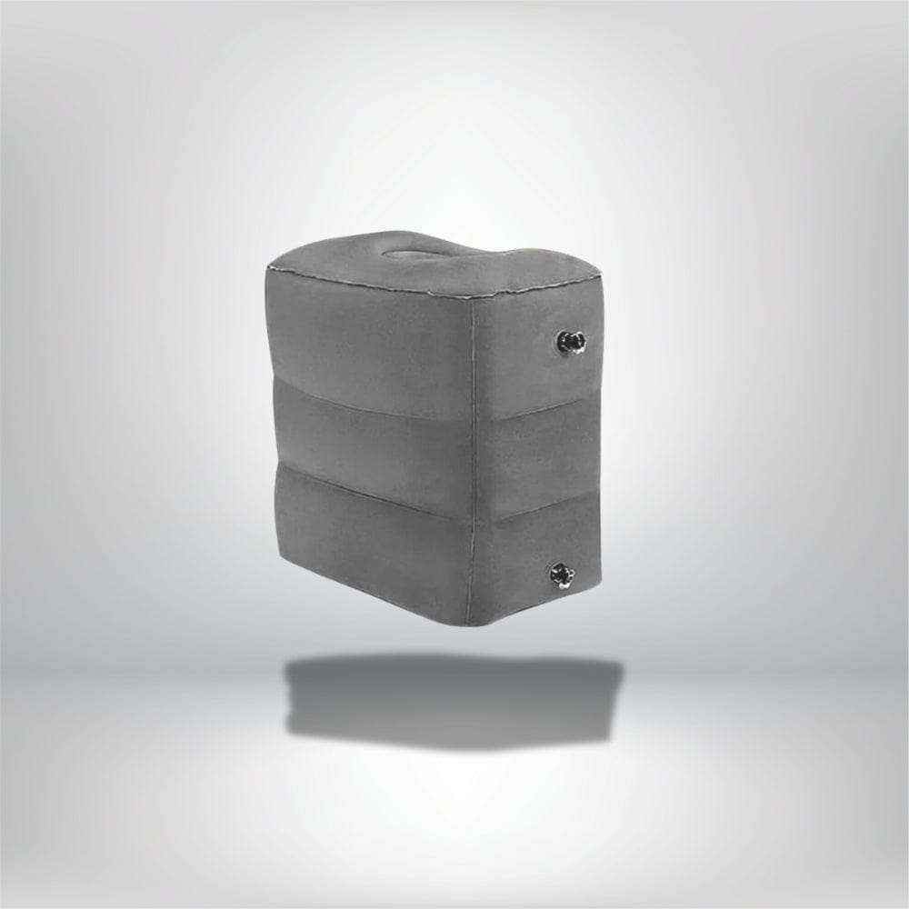 Coussin gonflable gris avec une forme ergonomique, idéal pour un confort optimal en avion