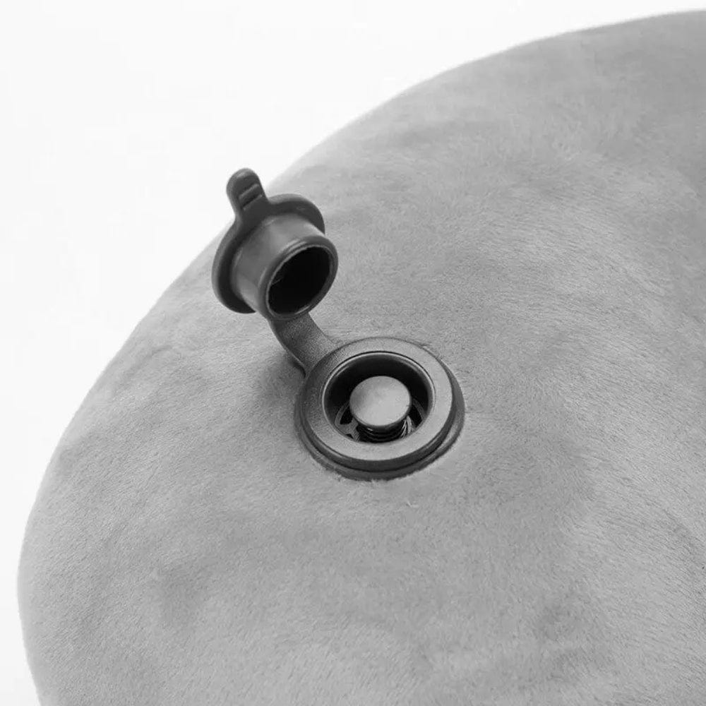 Coussin gonflable en velours gris avec valve, idéal pour le confort en avion ou en voyage