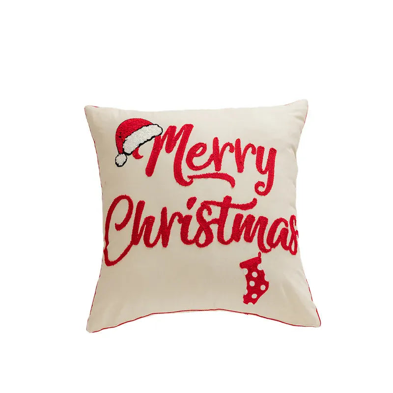 Coussin décoratif beige avec inscription rouge "Merry Christmas", motif de bonnet de Noël et chaussette, idéal pour le salon