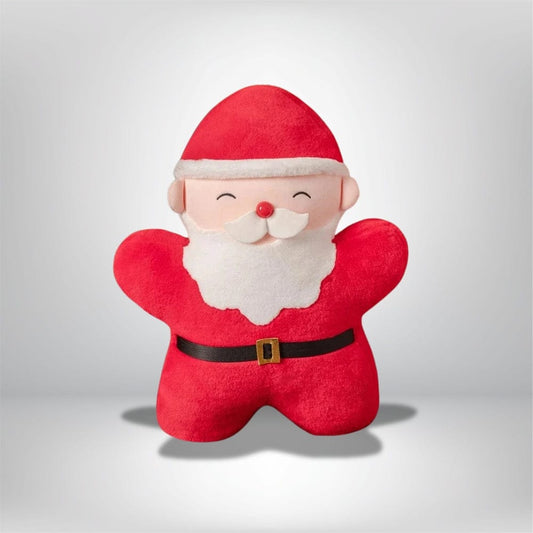Coussin décoratif en forme de Père Noël, rouge et blanc, parfait pour une ambiance festive sur un canapé