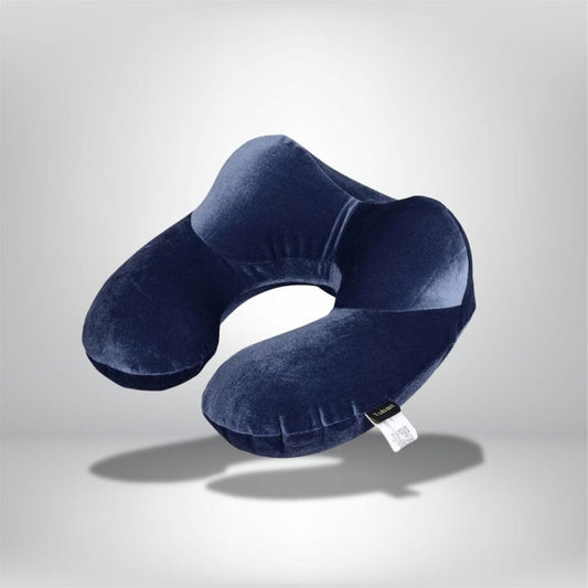 Coussin de voyage en velours bleu nuit, conçu pour un confort optimal dans un avion