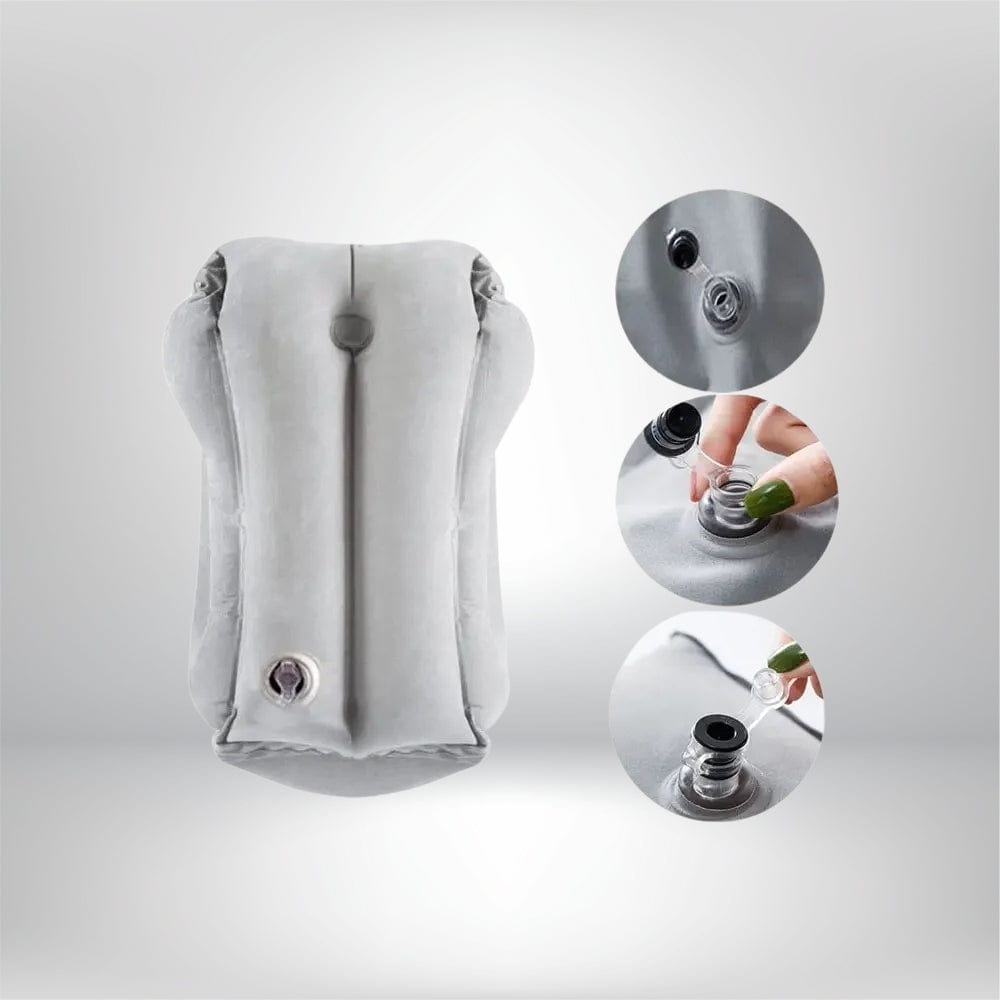 Coussin décoratif gris en matière douce, conçu pour un confort optimal sur un siège d'avion gonflable