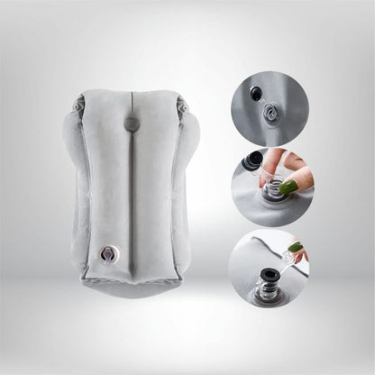 Coussin décoratif gris en matière douce, conçu pour un confort optimal sur un siège d'avion gonflable