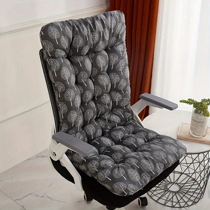 Coussin de chaise en tissu gris avec motifs d'arbres blancs, posé sur une chaise de bureau moderne