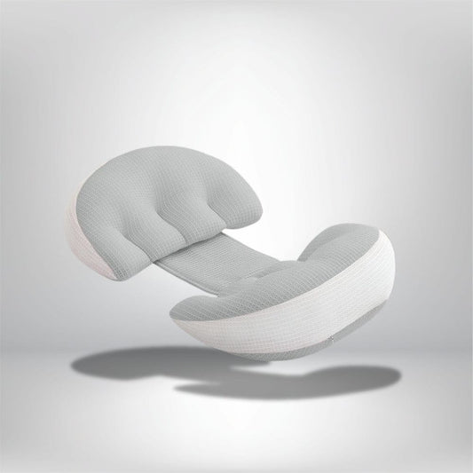 Coussin de soutien gris clair en forme ergonomique, idéal pour dormir, posé sur un fond neutre