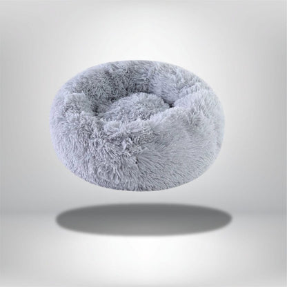 Coussin rond en fausse fourrure grise, idéal pour un coin douillet dans le salon ou la chambre