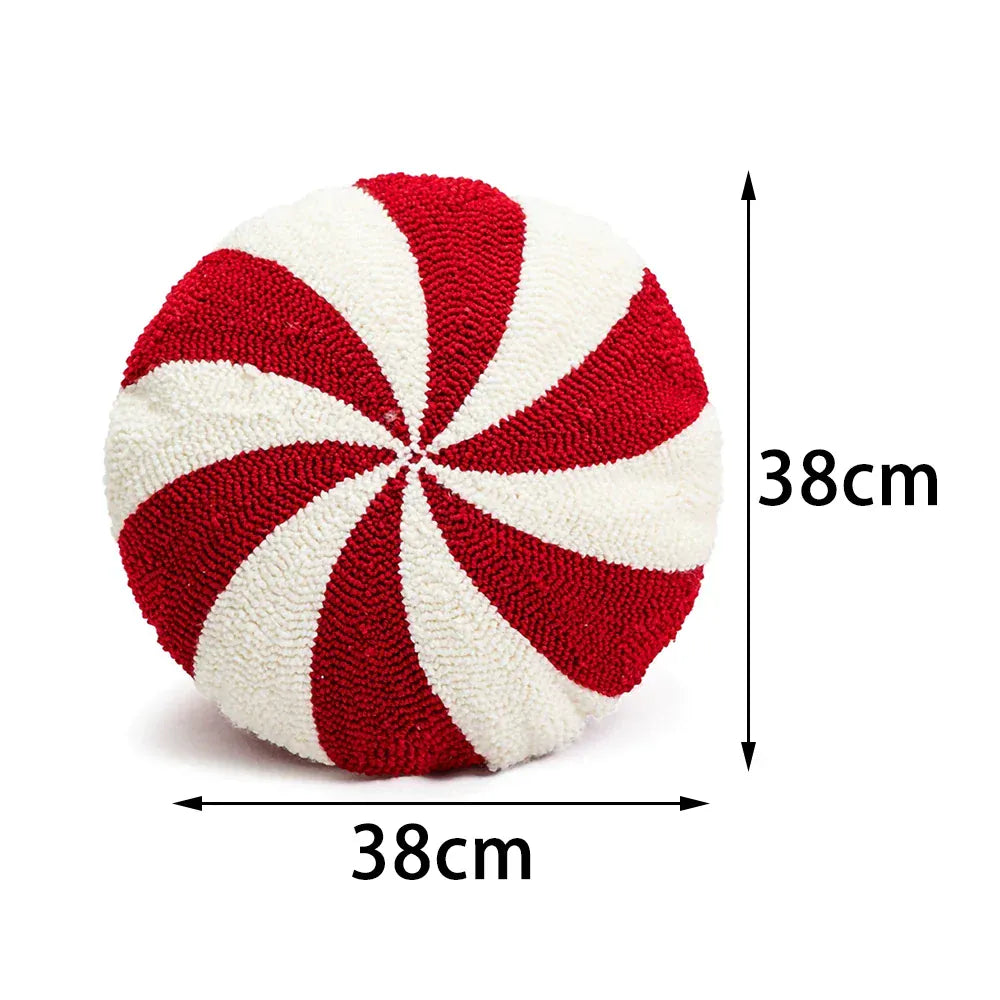 Coussin décoratif rond aux motifs rayés rouge et blanc, idéal pour un canapé ou une chaise