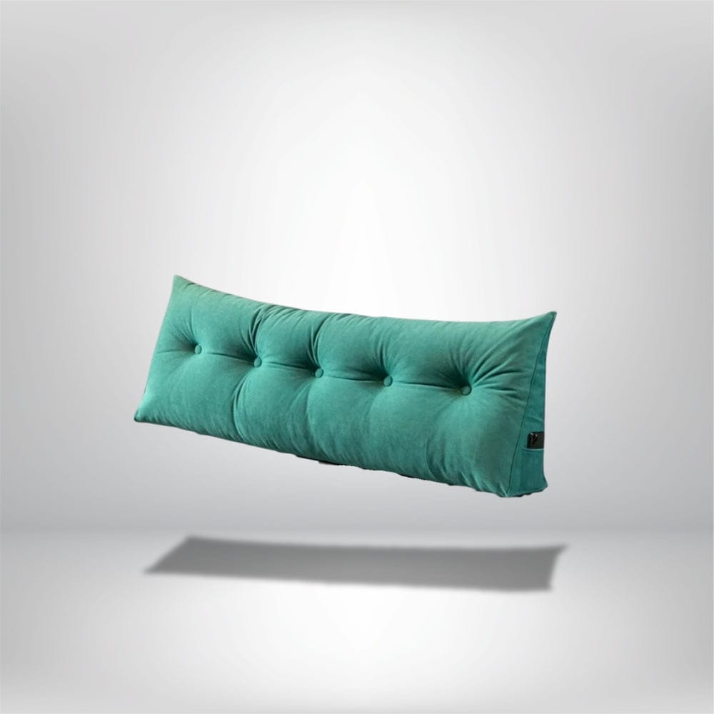 Coussin déco rectangulaire en velours vert avec des boutons, idéal pour une tête de lit moderne