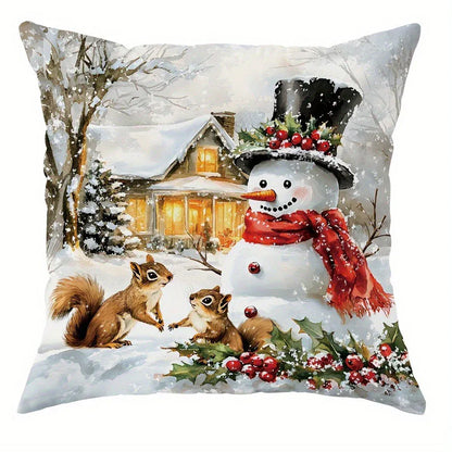 Coussin décoratif illustré avec un bonhomme de neige, des écureuils et des motifs de Noël sur un fond enneigé