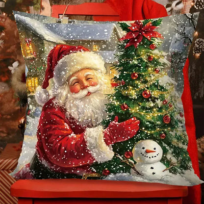 Housse de coussin 45x45 avec un motif de Noël représentant le Père Noël et un sapin décoré, sur un canapé