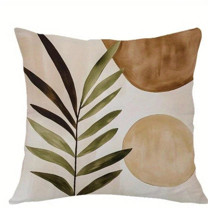 Housse de coussin décoratif avec motifs géométriques de feuilles vertes et cercles beige sur fond crème