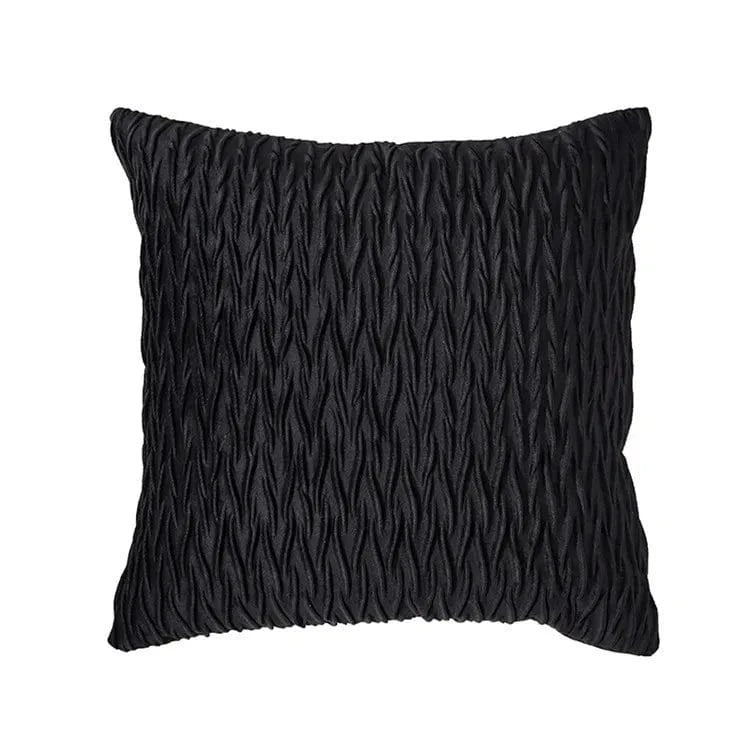 Coussin décoratif noir texturé, idéal pour un canapé moderne, ajoutant une touche élégante à votre salon