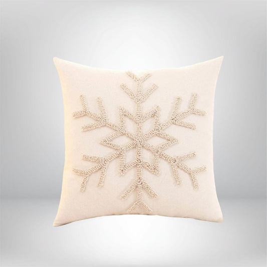 Coussin décoratif beige avec motif flocon de neige, idéal pour un canapé ou un lit pendant les fêtes