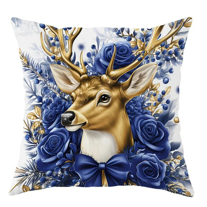 Coussin décoratif avec un motif de cerf doré entouré de roses bleues sur fond blanc, idéal pour un salon