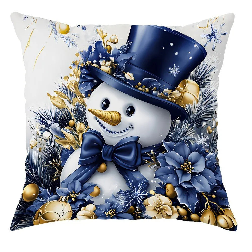 Coussin décoratif avec un bonhomme de neige, motifs bleus et dorés, idéal pour un canapé ou un lit