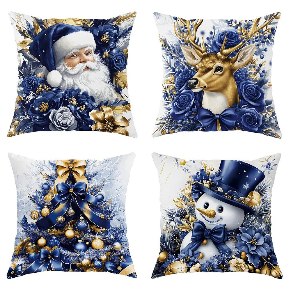 Coussins décoratifs aux motifs de Noël, avec des couleurs bleu, or et blanc, sur un canapé élégant