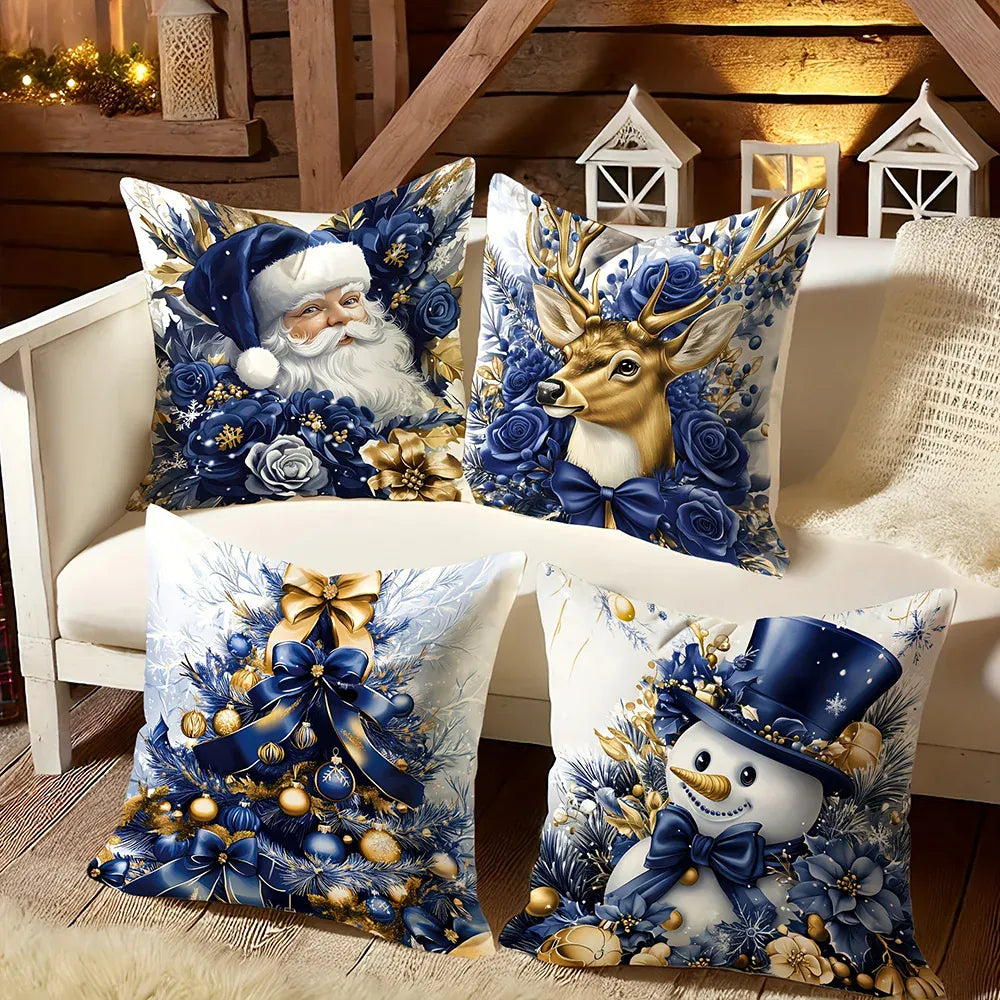 Coussins décoratifs aux motifs de Noël, représentant un Père Noël, un renne, un bonhomme de neige et un sapin, sur
