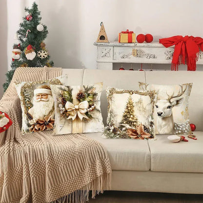 Housses de coussin décoratives avec motifs de Noël, représentant un père Noël, un cerf et un sapin, sur un canapé