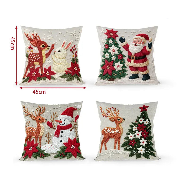 Quatre coussins décoratifs avec des motifs de Noël, représentant un renne, un lapin, un bonhomme de neige et un sapin