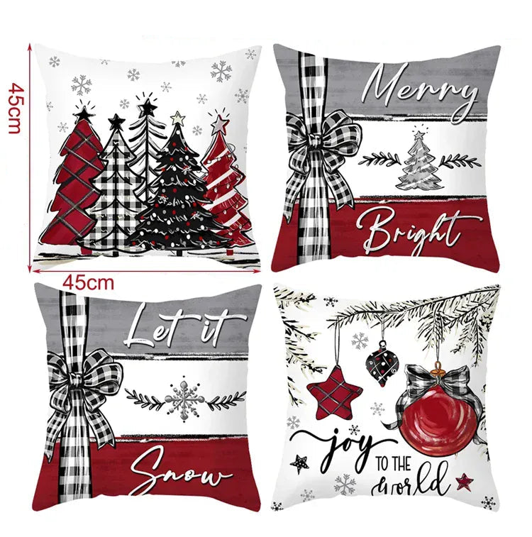 Housses de coussin décoratives aux motifs de Noël, rouges et gris, disposées sur un canapé moderne