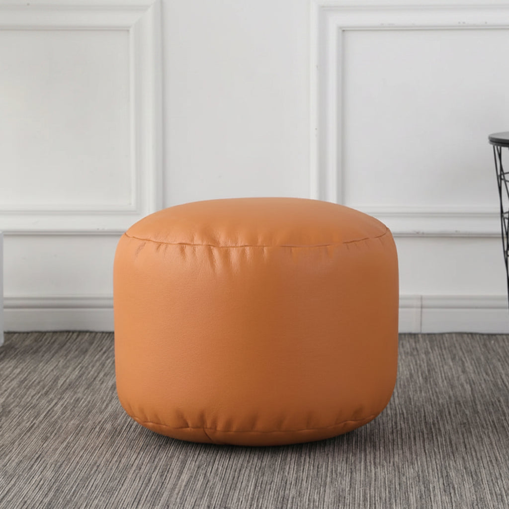 Petit pouf rond repose-pieds effet cuir couleur ocre
