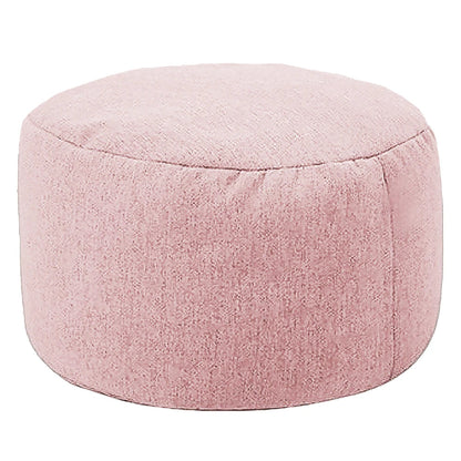Petit pouf rond rose poudré pour salon
