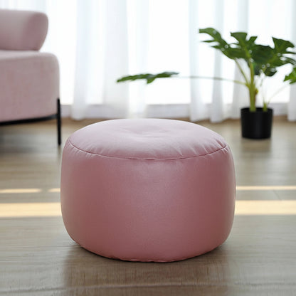 Petit pouf rond repose-pieds effet cuir rose poudré