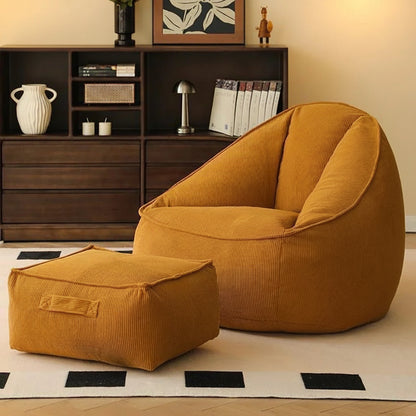 Pouf poire géant avec repose-pieds en jaune moutarde